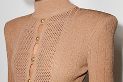 Ang mga pakinabang at katangian ng mga niniting na tela.